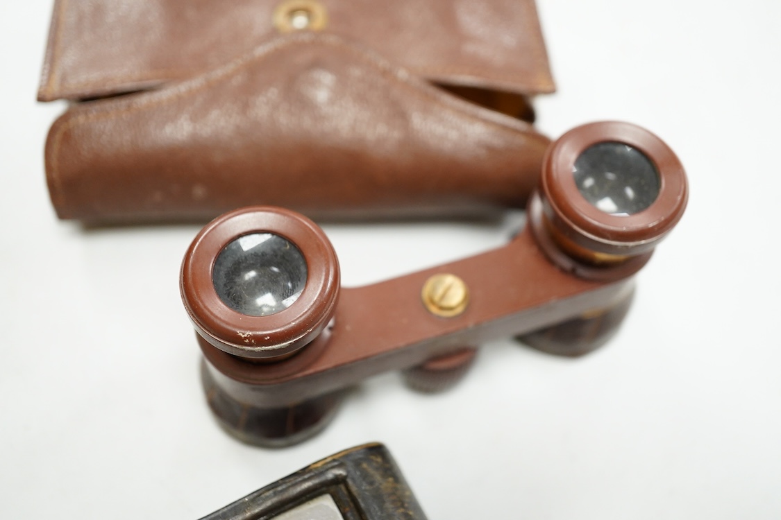 A Le Coultre desk timepiece, and four pairs of opera glasses
